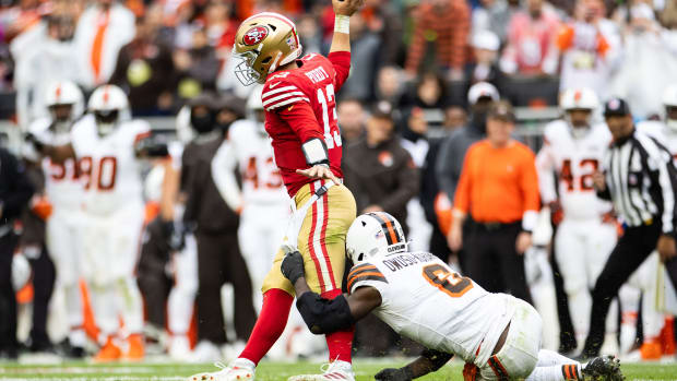 Oct 15, 2023; Cleveland, Ohio, USA; Cleveland Browns linebacker Jeremiah Owusu-Koramoah (6) tackles San Francisco 49ers quarterback Brock Purdy (13) as he throws the ball away during the fourth quarter at Cleveland Browns Stadium.